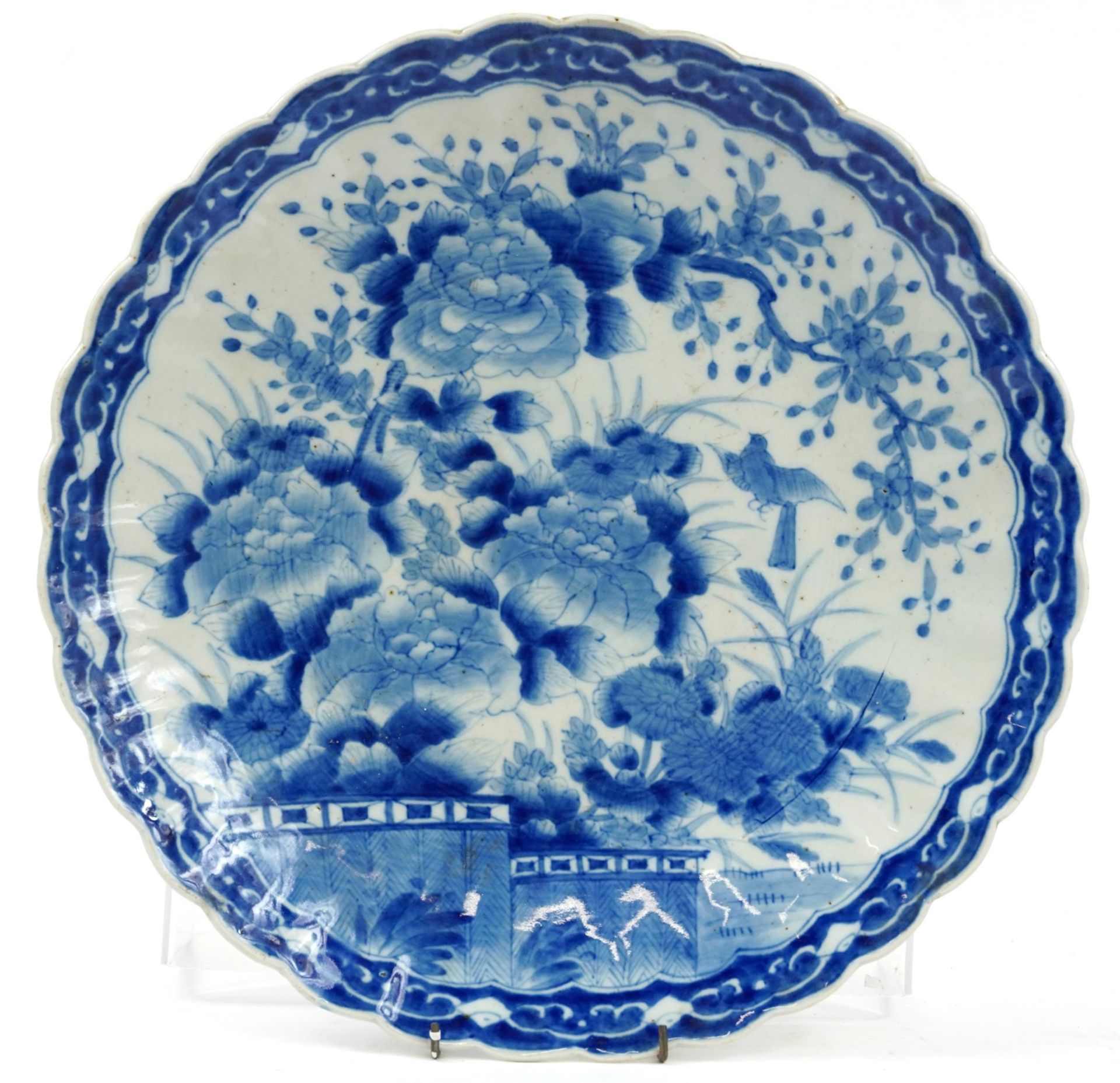 Japanese blue and white porcelain charger hand painted with bird of paradise amongst flowers, 40cm