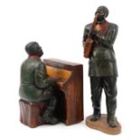 Two large jazz playing musicians playing the piano and saxophone, the largest 54cm high : For