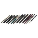 Vintage and later fountain pens and propelling pencils, some with gold nibs, including Parker and