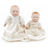 Two German bisque headed dolls, one with open/close eyes, comprising Koppelsdorf 350.2/O and