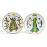 Pair of Turkish Ottoman Kutahya pottery dishes hand painted with figures wearing traditional dress