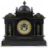 Large Victorian black slate mantle clock with gilt brass columns and mounts, the enamelled chapter