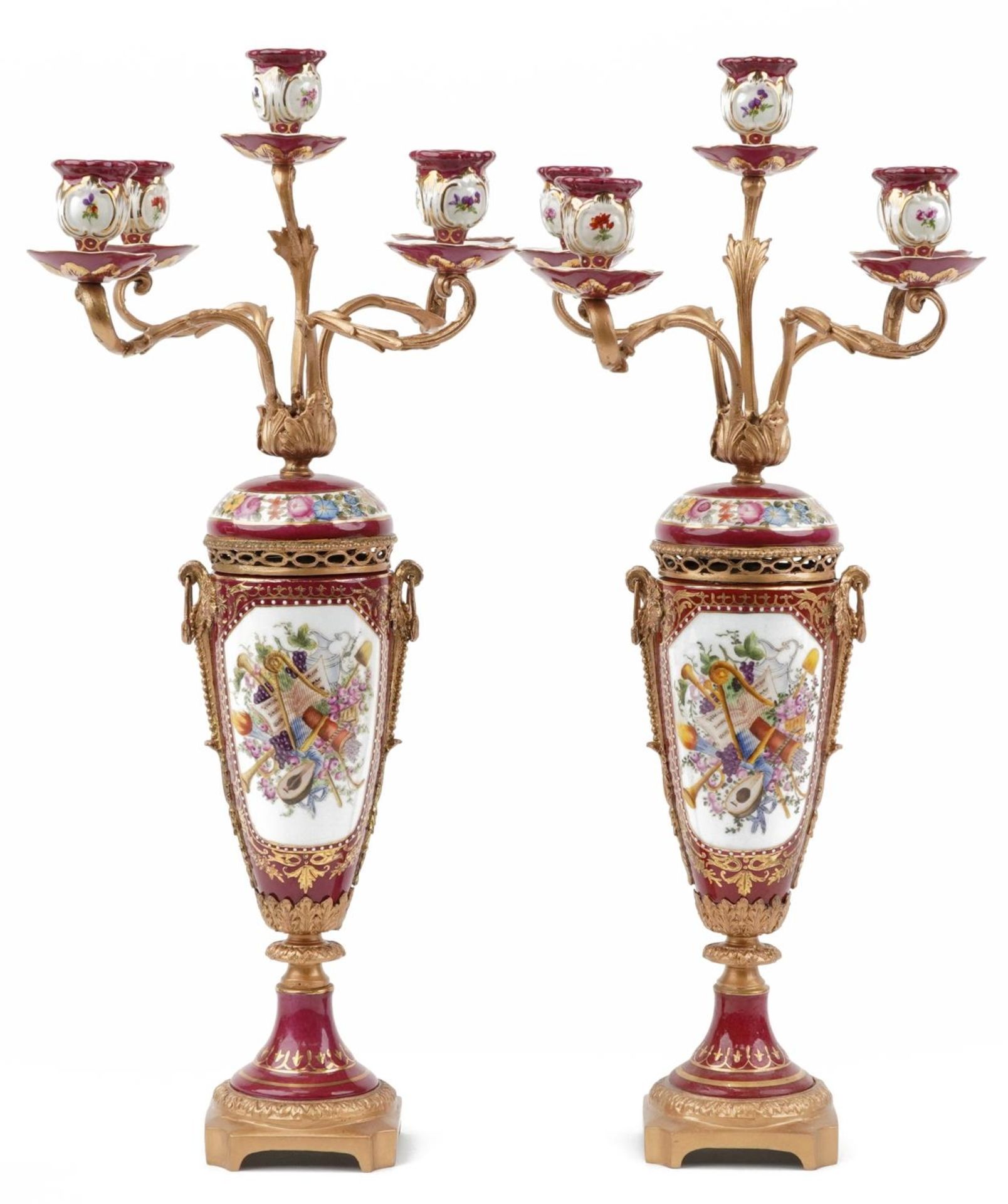 Manner of Sevres, pair of continental porcelain five branch candelabras with gilt bronze mounts,