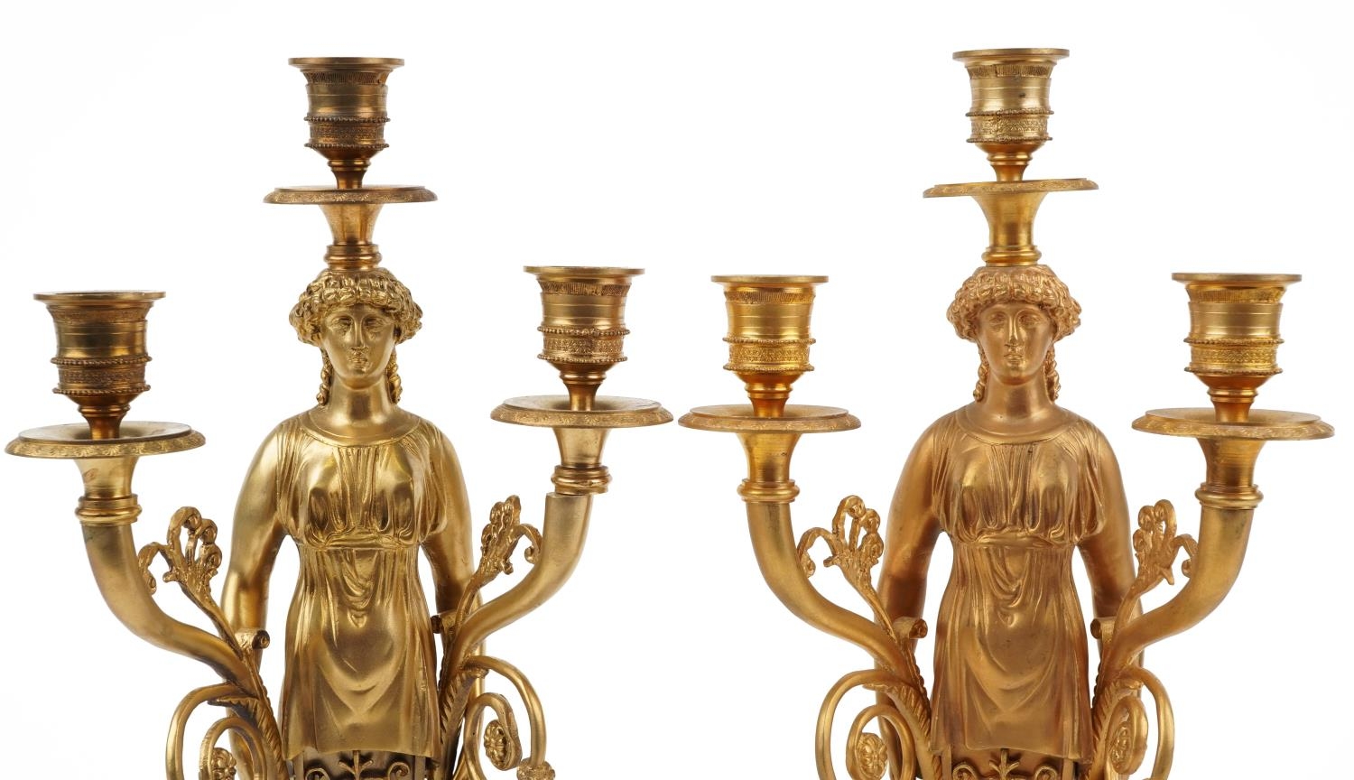 Pair of French Empire style ormolu three branch figural candelabras raised on square marbleised - Image 2 of 4