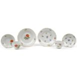 Meissen, German porcelain hand painted with flowers comprising two cups with saucers and two plates,