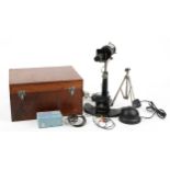 C Baker, vintage electric projector microscope with fitted case and accessories numbered 508622 :
