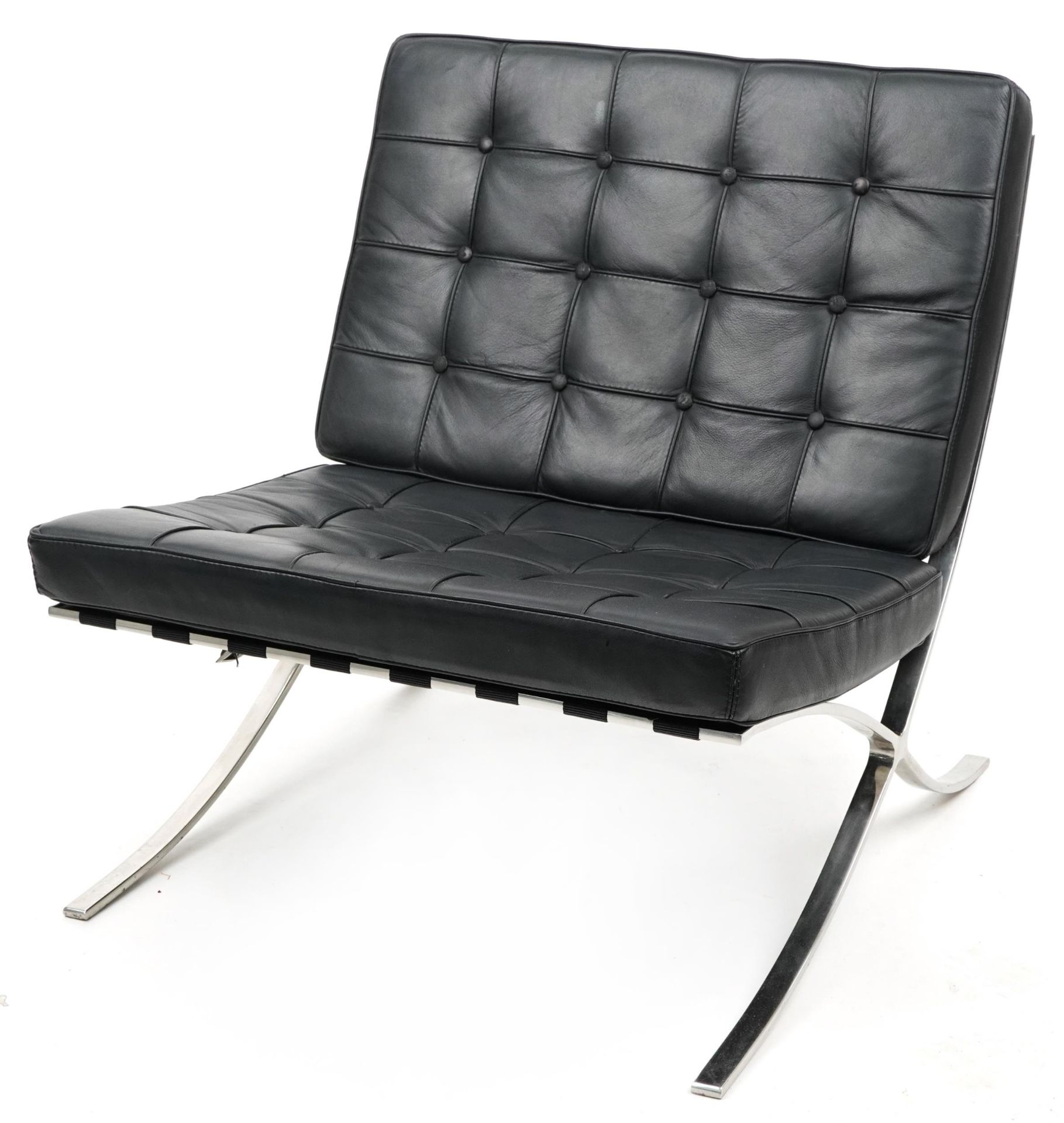 Chrome Barcelona chair with lift off cushions, designed by Ludwig Mies Van Der Rohe and Lilly Reich,