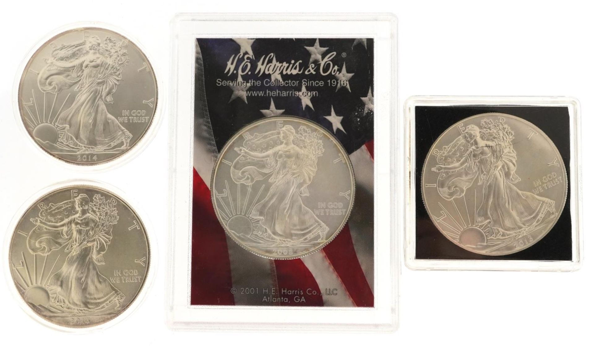 Four United States of America one ounce fine silver Liberty dollars comprising dates 2008, 2013,