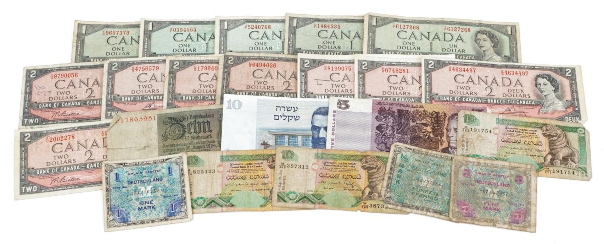 World banknotes including Canadian one dollar and Australian five dollars : For further