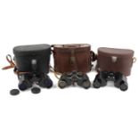 Three pairs of binoculars with cases comprising Carl Zeiss 8 x 30, Asahi Pentax 8 x 30 and Wrayvu