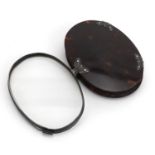 19th century unmarked silver and tortoiseshell folding magnifying glass, 8cm wide : For further