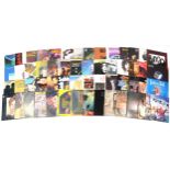 Vinyl LP records including Dire Straits, Kiss, Diana Ross, Status Quo, Shirley Bassey and The