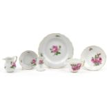 Meissen, German porcelain hand painted with roses comprising cup with saucer, side plate, eggcup and