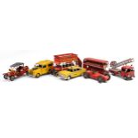 Six vintage style tinplate vehicles including London buses and fire truck, the largest 40cm in