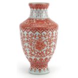 Chinese porcelain vase hand painted in iron red with flower heads amongst scrolling foliage within