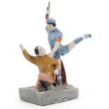 Chinese porcelain Cultural Revolution propaganda figure group of an execution, 35.5cm high : For