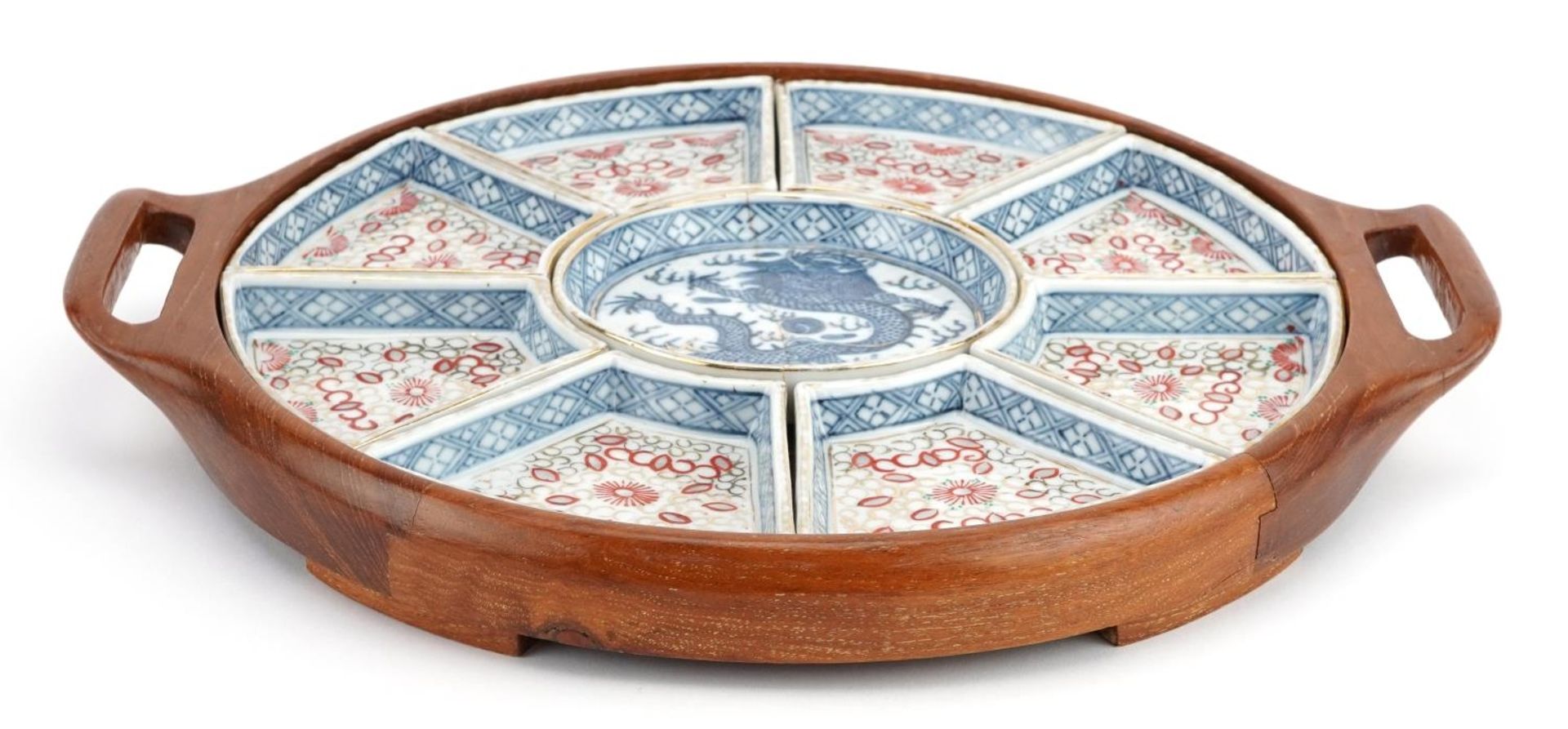 Chinese blue and white porcelain lazy Susan hand painted with a dragon housed in a hardwood tray,