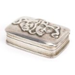 Ari D Norman, Elizabeth II silver pillbox embossed with two theatrical masks, London 1991, 4cm wide,