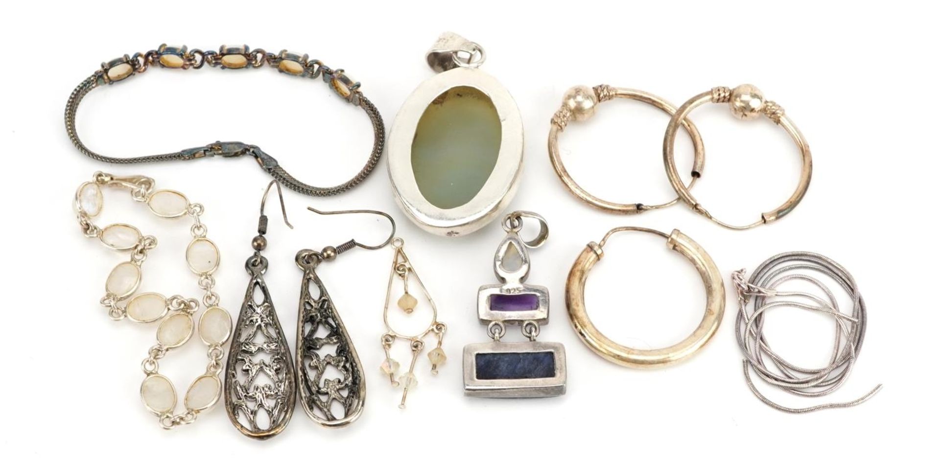 Silver and white metal jewellery including two cabochon pendants, drop earrings and two bracelets, - Image 4 of 5