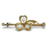 Victorian 15ct gold cabochon opal, seed pearl and ruby floral bar brooch with safety chain, 4.1cm