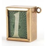 9ct gold emergency one pound note charm, 1.5cm high, 2.2g : For further information on this lot