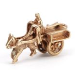 9ct gold horse drawn cart figure with rotating wheels, 2.4cm wide, 3.2g : For further information on