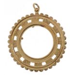 9ct gold sovereign pendant mount with pierced decoration, 3.7cm high, 5.0g : For further information