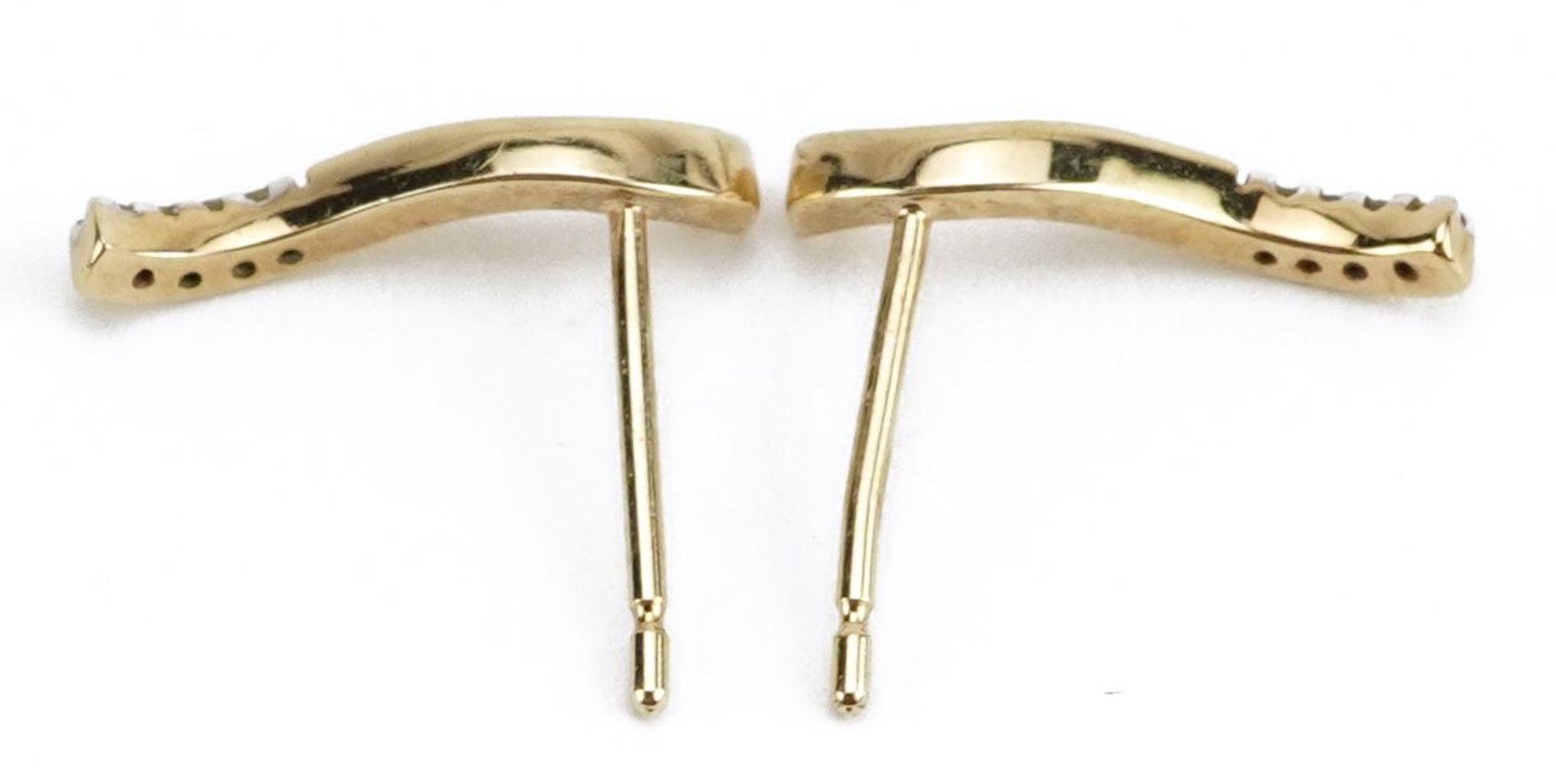 Pair of unmarked gold diamond stud earrings, 1.5cm high, 1.0g : For further information on this - Image 2 of 2