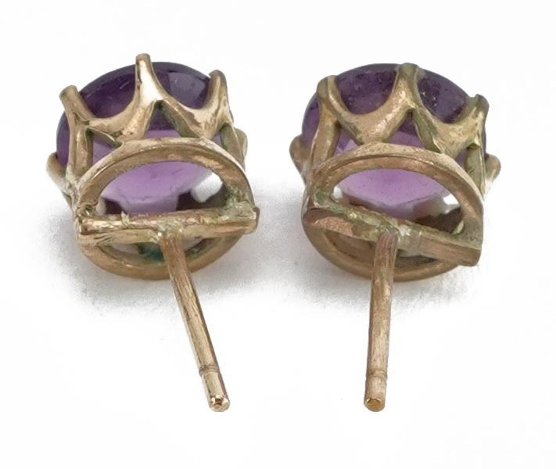 Pair of unmarked gold purple paste stud earrings, 8mm in diameter, 1.4g : For further information on - Image 2 of 3