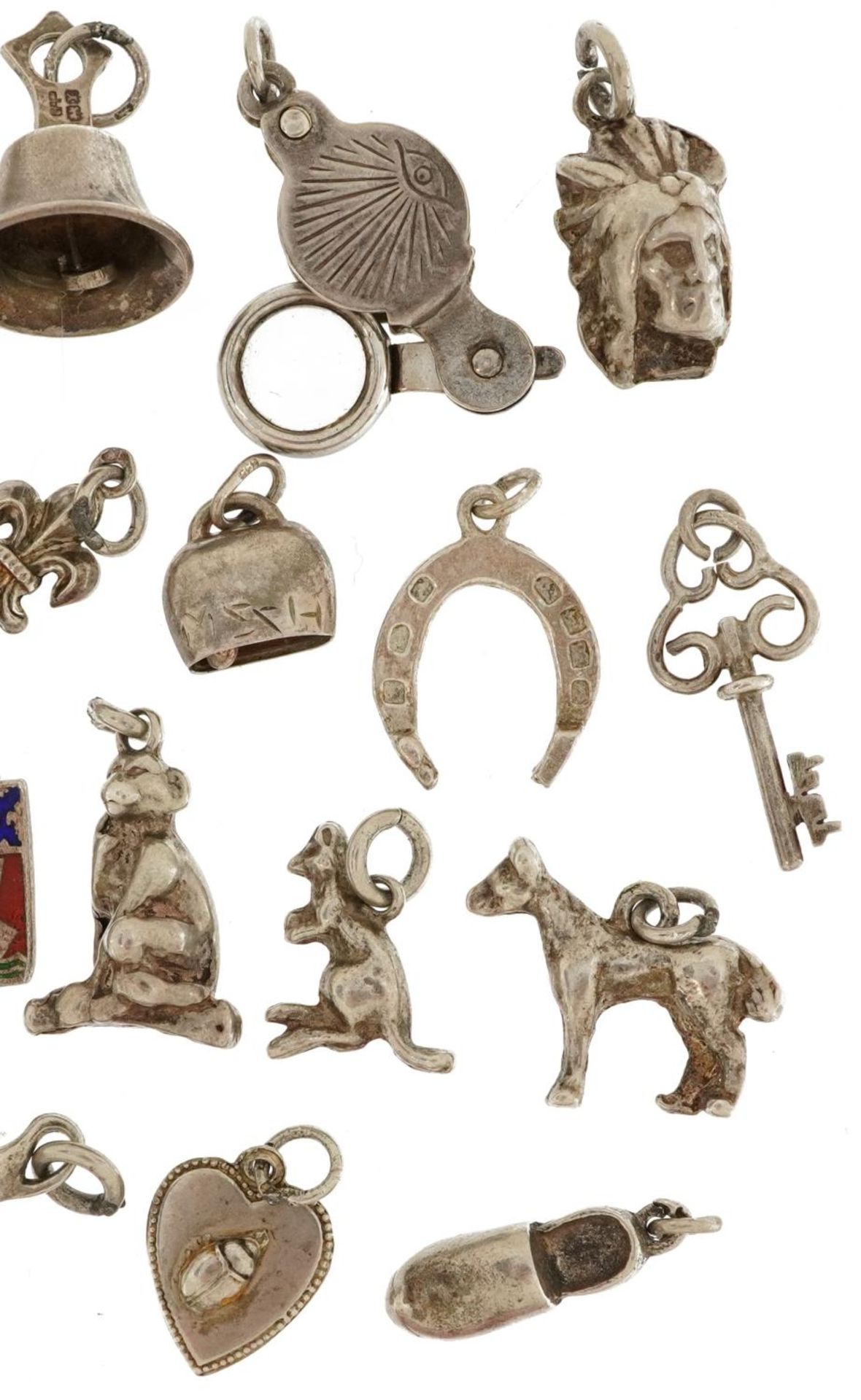 Silver and white metal charms including opening magnifying glass, fleur de lis, enamel bell and - Image 3 of 3