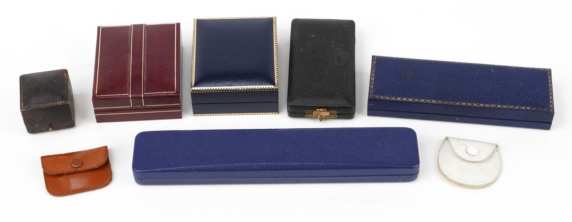 Six Vintage jewellery and watch boxes and two leather pouches including Garrard & Co, Walker & hall,