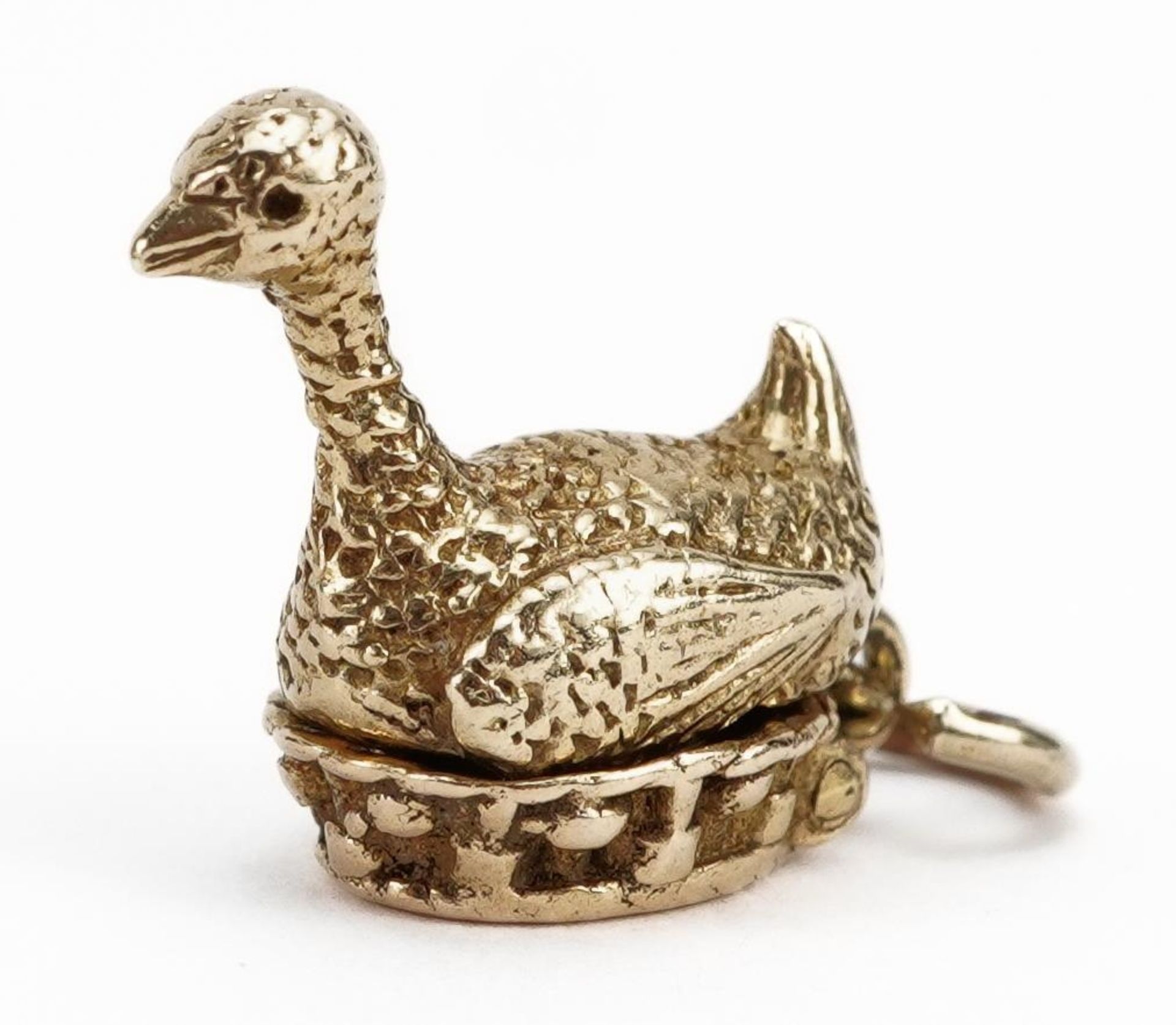 9ct gold opening goose and golden egg charm, 1.5cm high, 3.6g : For further information on this