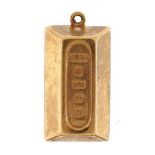 9ct gold ingot charm, 2.0cm high, 1.3g : For further information on this lot please contact the