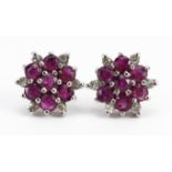 Pair of 9ct gold ruby and diamond cluster stud earrings, 1.0cm in diameter, 1.6g : For further