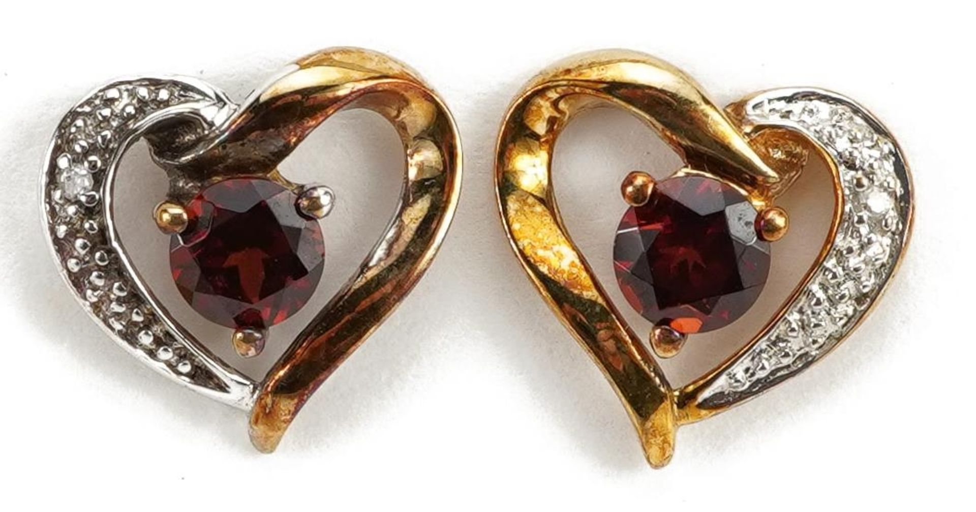 Pair of 9ct gold garnet and diamond love heart stud earrings, 1.0cm high, 1.2g : For further