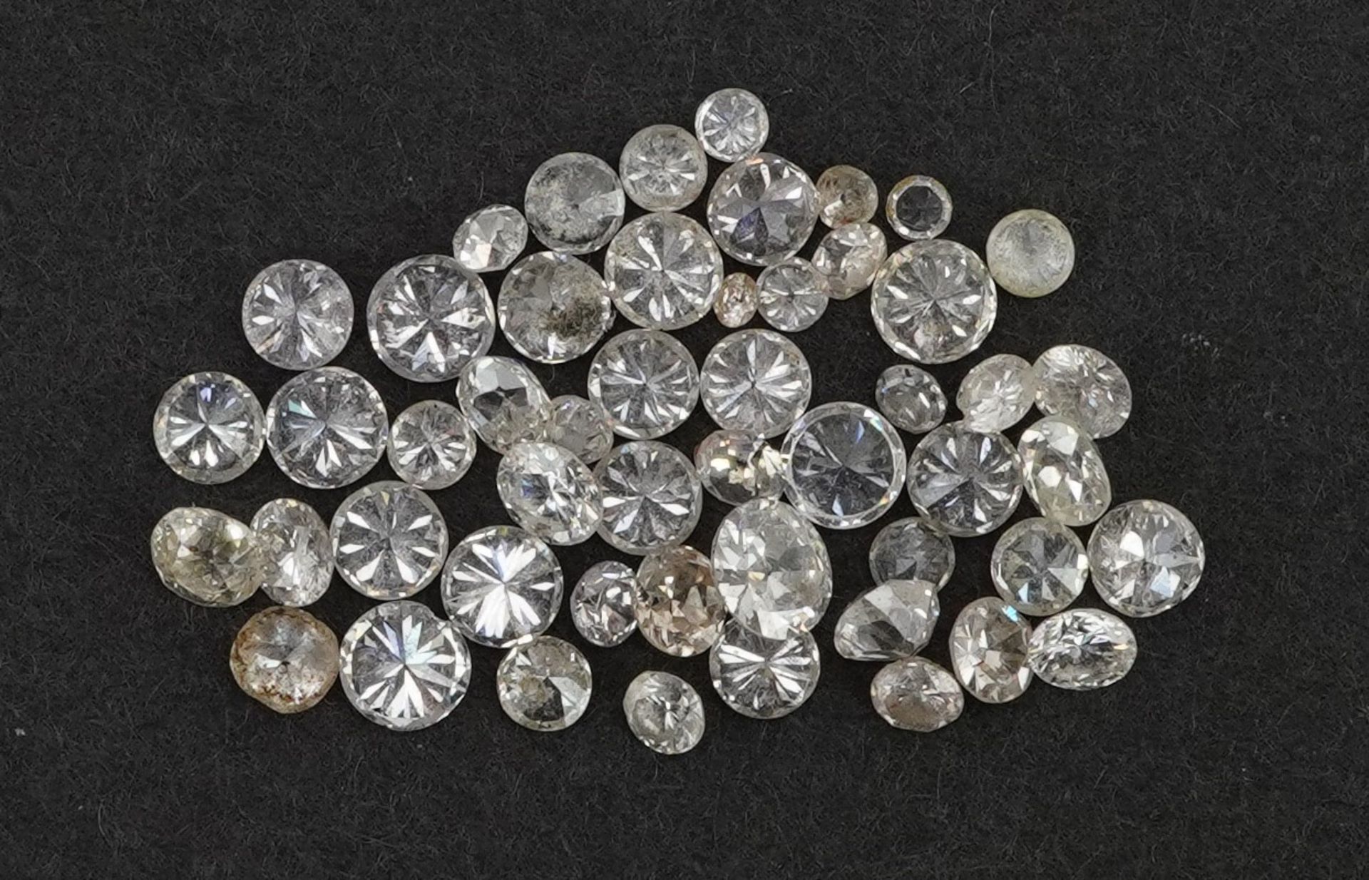 Collection of loose solitaire diamonds, the largest approximately 3.2mm in diameter, total weight