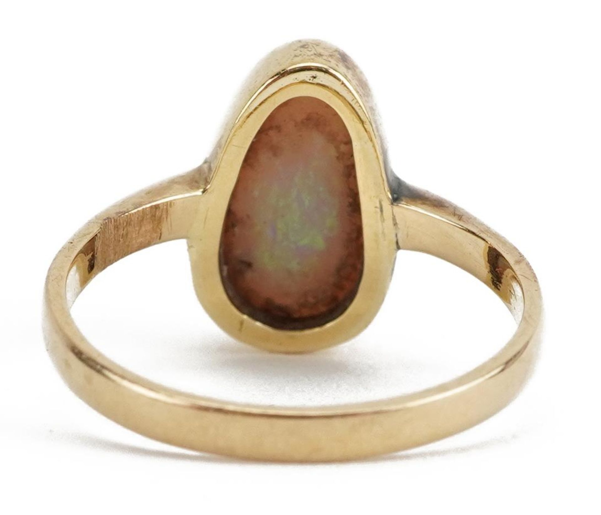 Unmarked gold cabochon opal ring, tests as 18ct gold, the opal approximately 12.0mm x 7.0mm, size O, - Image 2 of 3