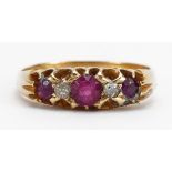 18ct gold ruby and diamond five stone ring, the largest ruby approximately 3.7mm in diameter,