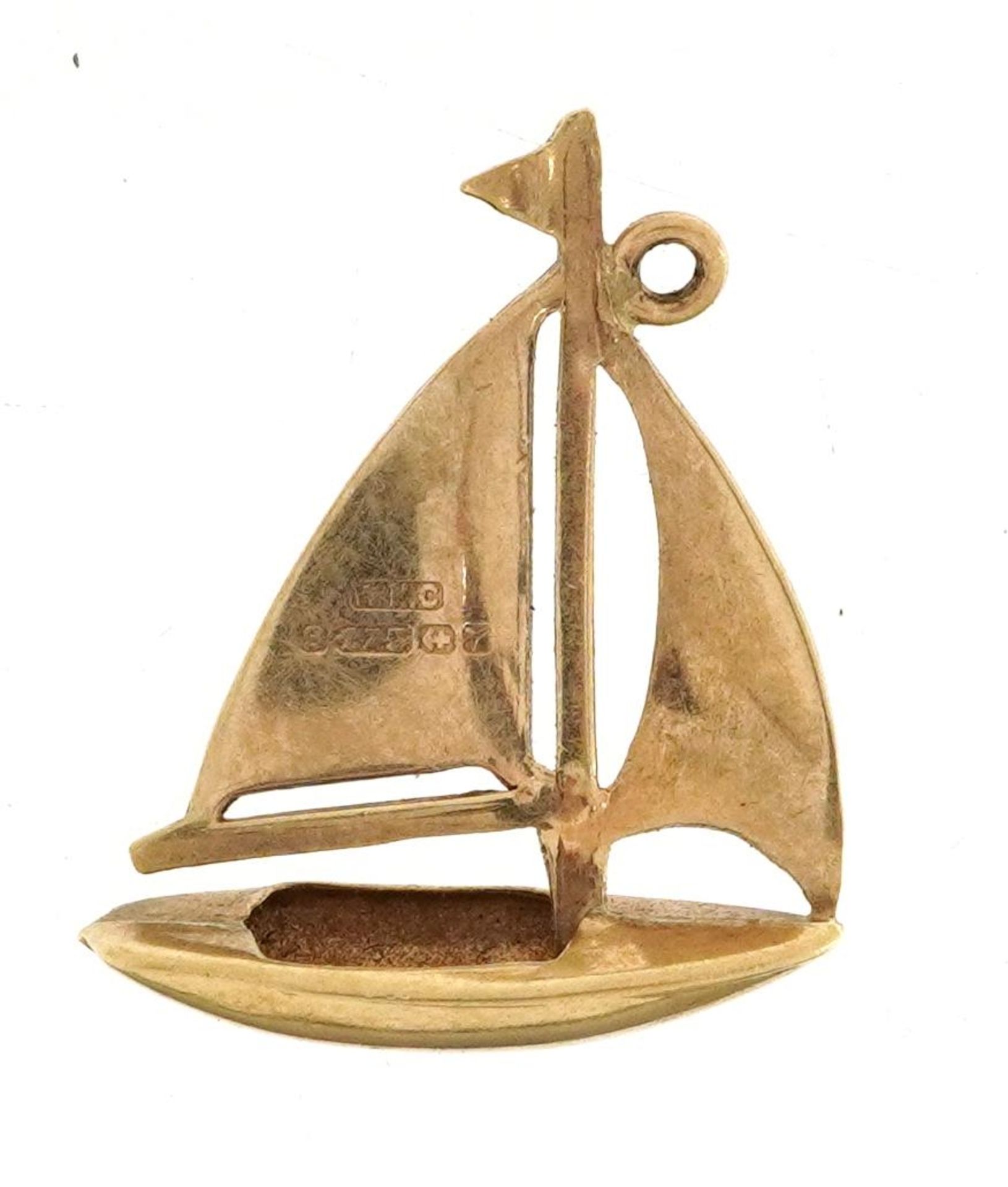 9ct gold yacht charm, 1.7cm high, 0.6g : For further information on this lot please contact the