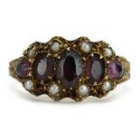 Victorian 9ct gold garnet and seed pearl ring with engraved band, the largest garnet approximately