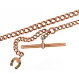 9ct rose gold watch chain with T bar and lucky horseshoe set with seed pearls, 40cm in length, 22.9g