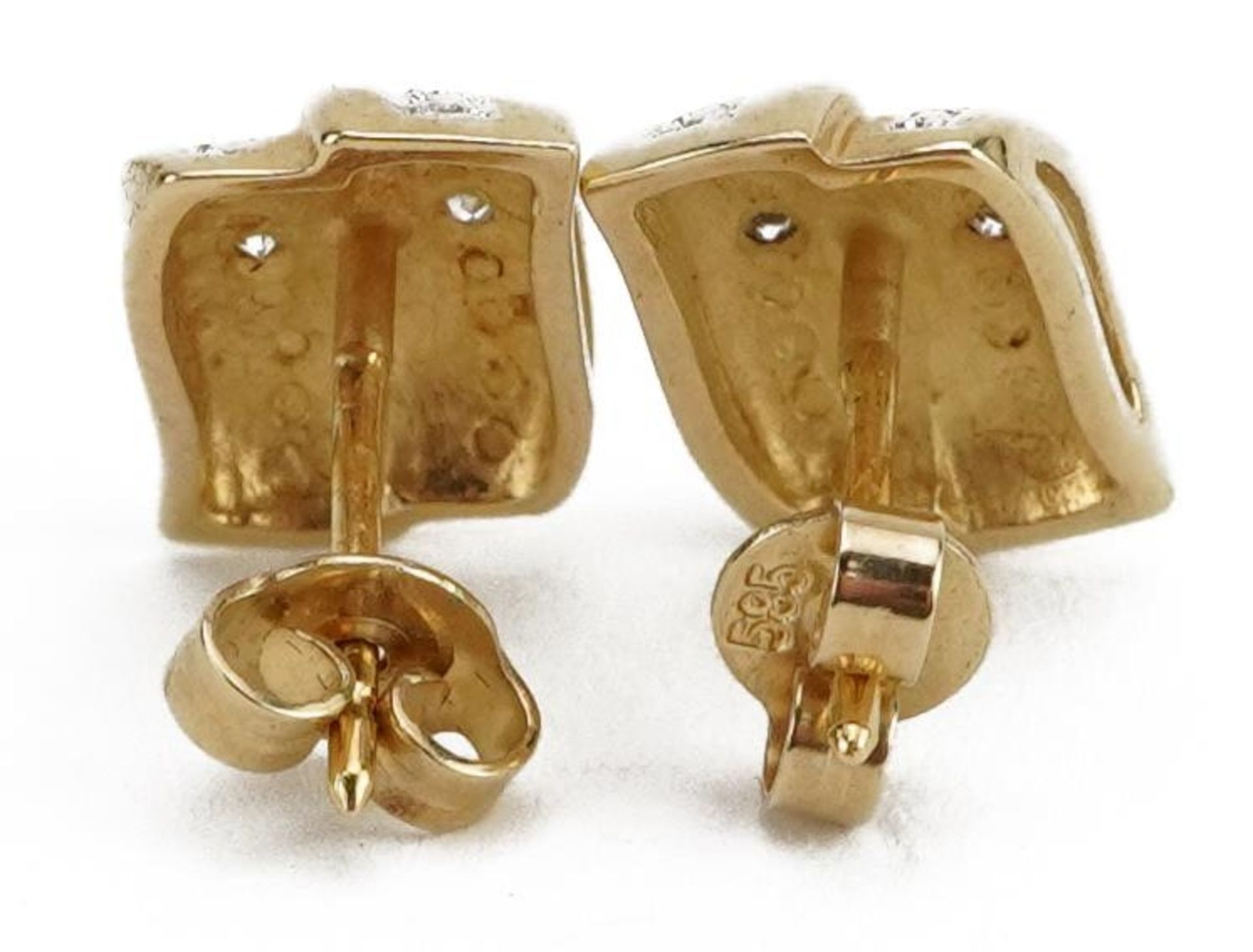 Pair of 9ct gold diamond two row stud earrings, the butterflies marked 585, 1.2cm high, 2.7g : For - Image 2 of 2