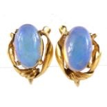 Pair of 14k gold cabochon opal earrings with screw backs, each opal approximately 11mm x 6.7mm, 1.