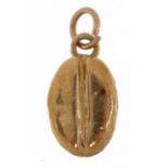 9ct gold coffee bean charm, 1.4cm high, 1.3g : For further information on this lot please contact