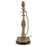 Patinated bronze table lamp in the form of a classical female holding her dress, 42.5cm high : For