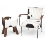 Brutalist style wrought iron and cow hide armchair and a cow hide stool : For further information on