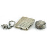 Silver objects comprising rectangular match case, circular pillbox with hinged lid and a tortoise