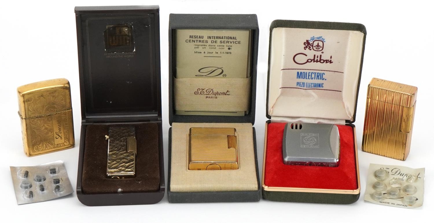 Vintage and later lighters including two S J Dupont, one with fitted box and Zippo : For further