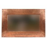 Arts & Crafts beaten copper wall mirror with embossed motto Preparing for a heavy stage, 82cm x 53cm