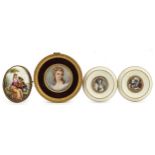 Three circular portrait miniatures including a hand painted example of a female together with a